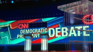 Hillary Clinton and Bernie Sanders will face off on Sunday at the next Democratic debate, moderated by CNN in Flint, Michigan.